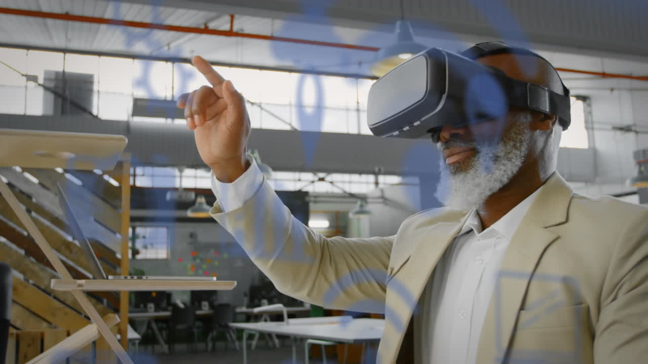 Blue digital icons floating against african american senior businessman wearing vr headset at office