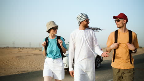 three travelers in the desert