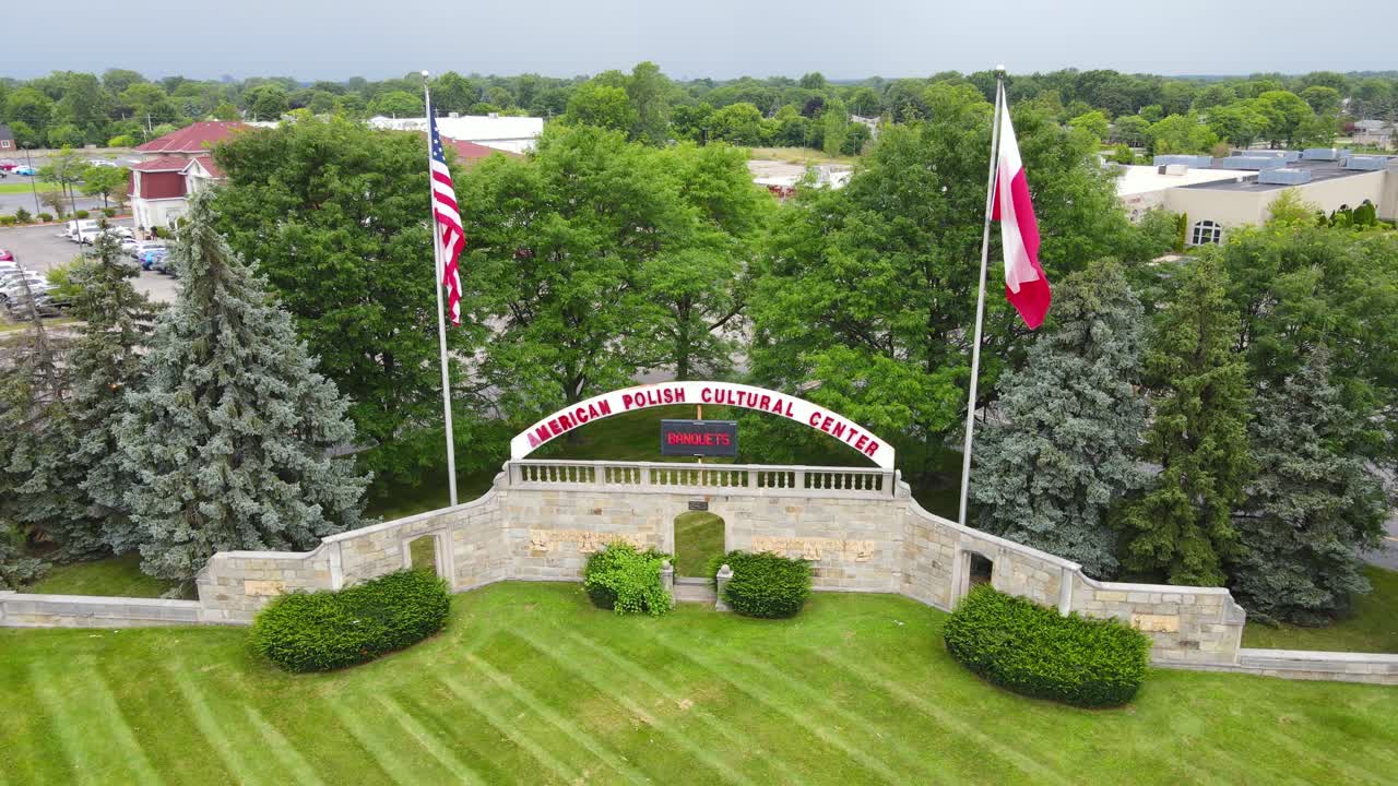 Aerial View of American Polish Cultural Center Sign with American and Polish Flags