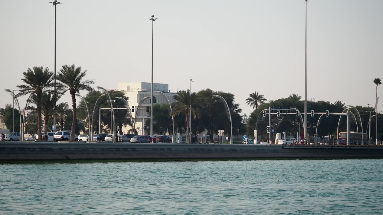 Coastal Cityscape with Palm Trees and Traffic