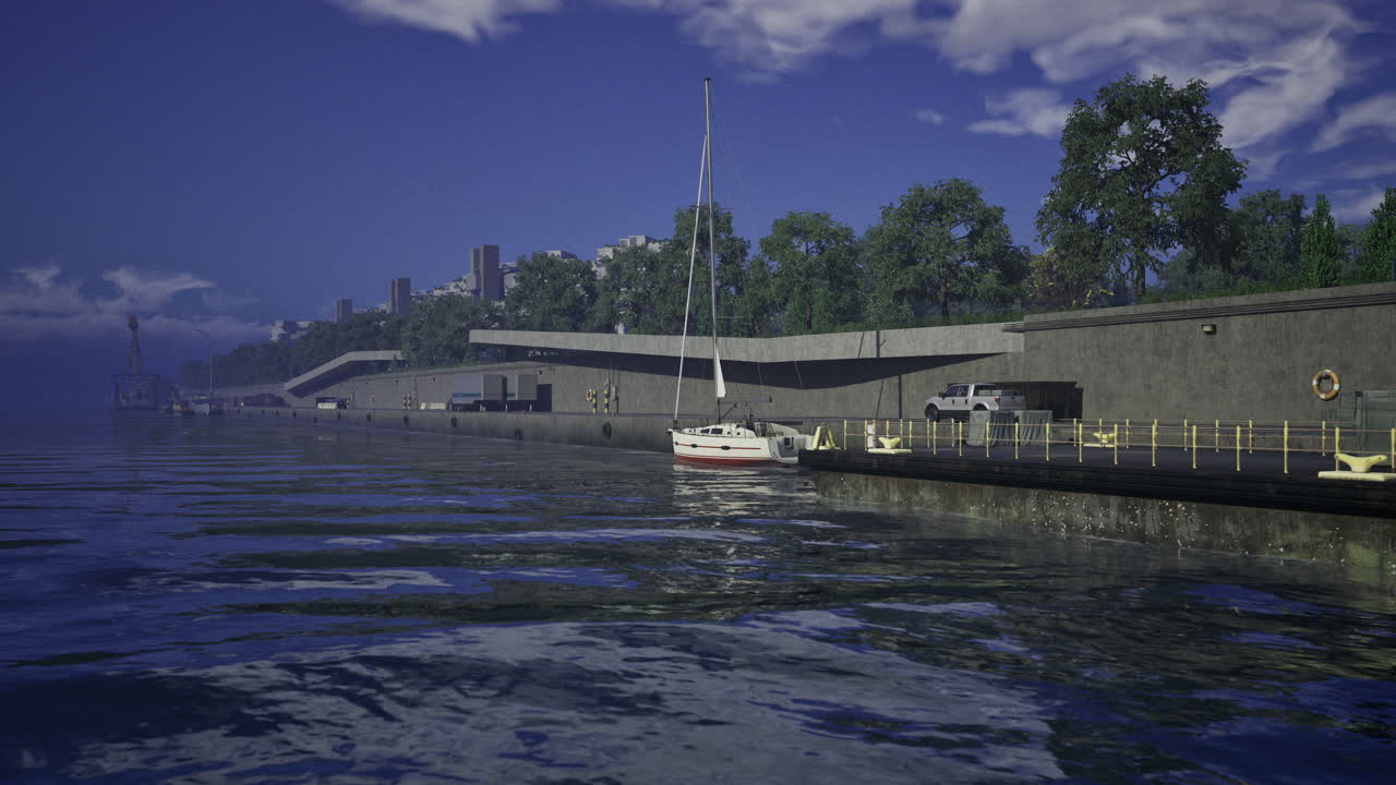 Sailboat anchored in calm harbor with trees and buildings under blue sky