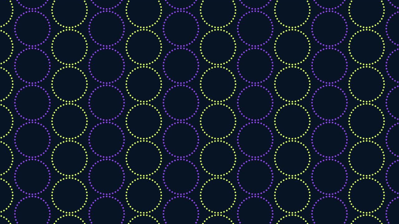 Circular pattern of purple and green circles on black background