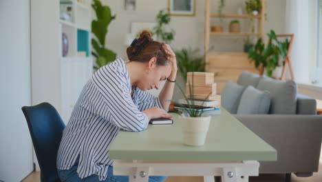 depressed sad woman at desk