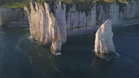 Aerial-footage-of-the-beautiful-French-coastline-along-the-village-of-Étretat