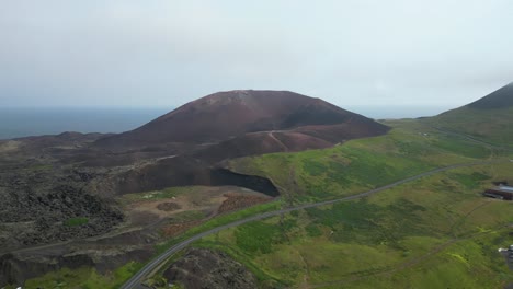 Volcanic-mountain-next-to-the-Atlantic-ocean-in-mid-summer