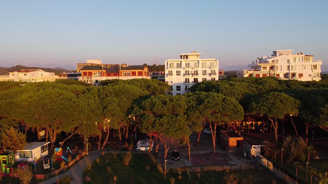 Aerial view of coastal suburban town in Durres, Albania, hotels and apartment buildings.