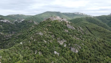 aerial view of a castle ruin on a mountaintop