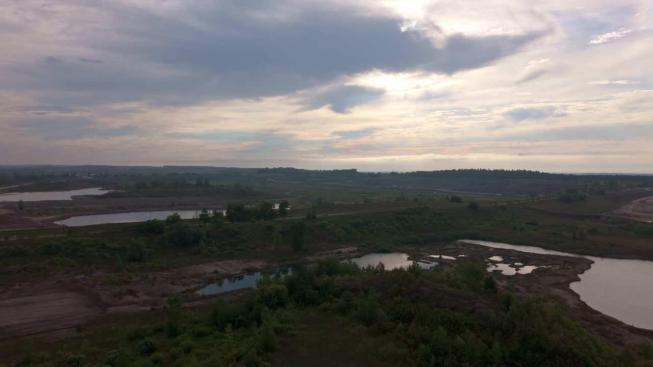 Gravel Pit And Aggregate Quarry At Sunrise In Caledon Village, Ontario, Canada. Aerial Flyover