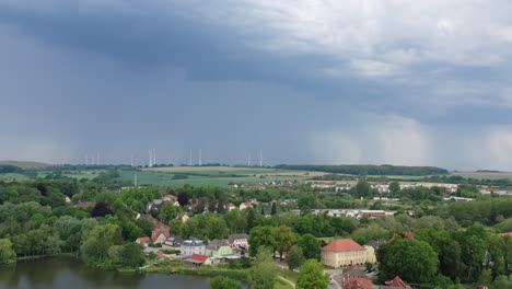 a thunderstorm brewing over a small town