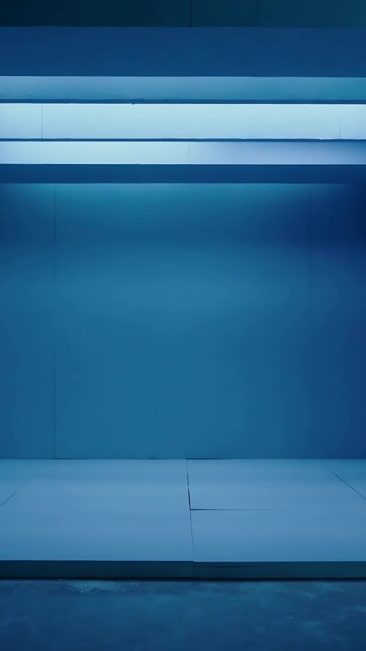 Vertical video: Drifting camera revealing blue wall seams and platform seam as light band dimming