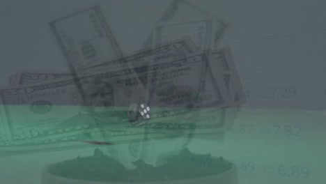 animations of cube over dollars banknotes