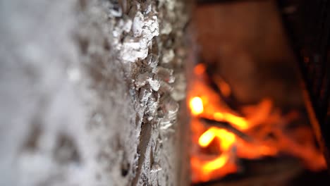 Burning-Embers-Radiating-Intense-Heat---Vertical-Shot