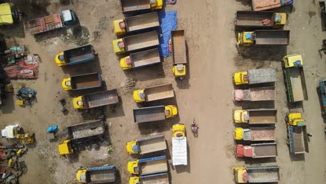 Aerial-shot-of-a-rickshaw-puller-pulling-his-rickshaw