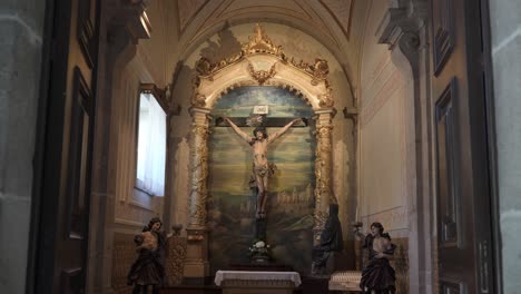 chapel with crucifix of jesus christ and ornate decorations