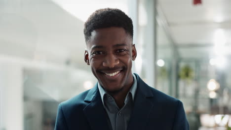 face, smile and young businessman in office