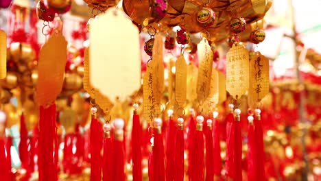 hanging golden bells with red tassels in temple