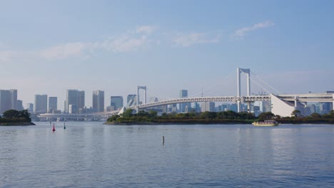 Odaiba-and-Rainbow-Bridge-in-Tokyo,-Background-Establishing-Shot-on-Sunny-Day-4k