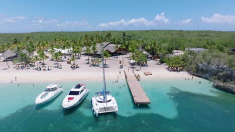 Exotic,-remote-hotel-resort,-Caribbean-travel-destination,-aerial-orbit-beach