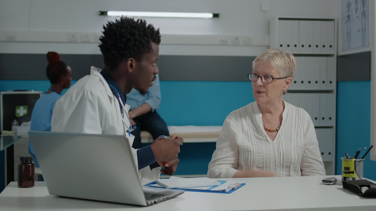 Person with doctor profession writing medical information