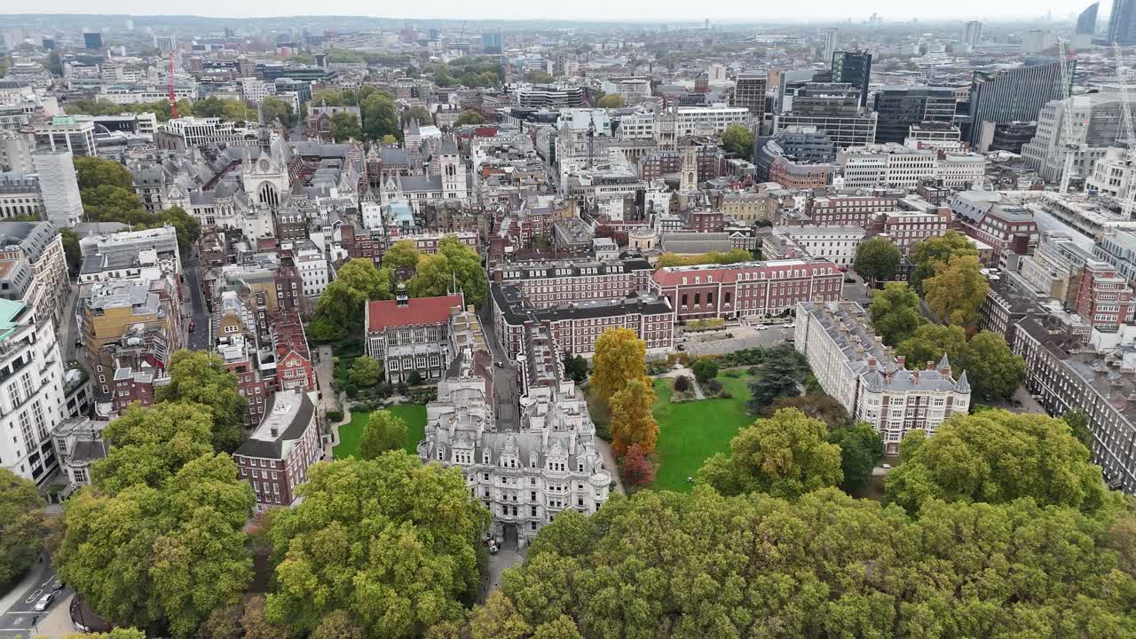 Aerial pan over The Honourable Society of the Middle Temple, Inner Temple Garden, and Temple Church in London. Historic Templar architecture and serene legal district atmosphere