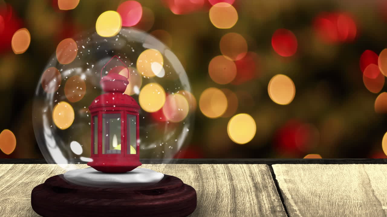 animación digital de la nieve cayendo sobre la linterna de navidad en el globo de nieve en superficie de madera