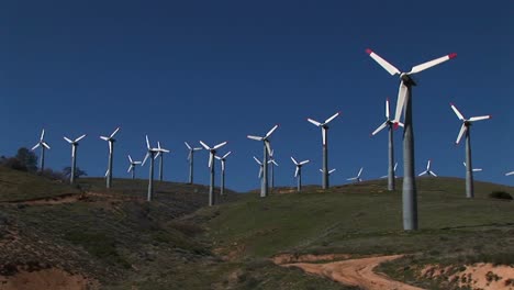 longshot of numerous wind turbines generating power at tehachapi california 2