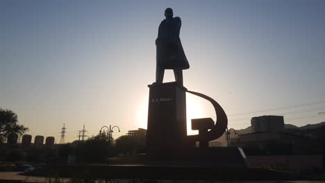 silhouette of lenin statue in khujand, tajikistan