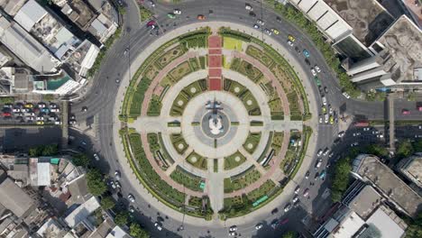 Descending-aerial-of-a-large-roundabout-street-view-traffic-cars-roads