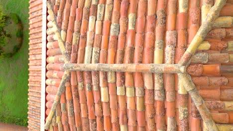 the red shingles roof of a house in the village