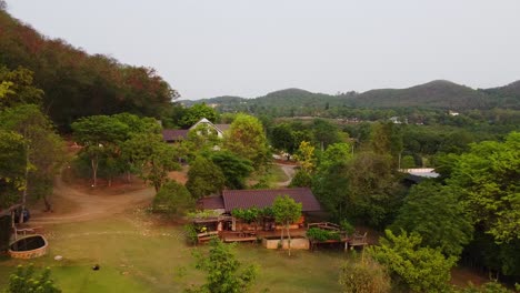 small wooden farmhouse in the mountains of northern thailand