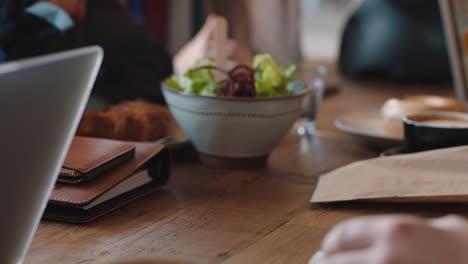 businessmen shaking hands in coffee shop enjoying successful business deal partnership