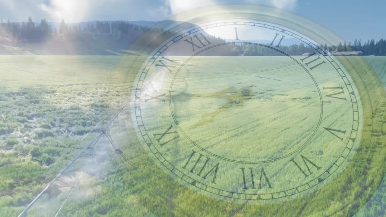 Camera push starting, clock turning while irrigation spraying, figure walking, showing crop growth