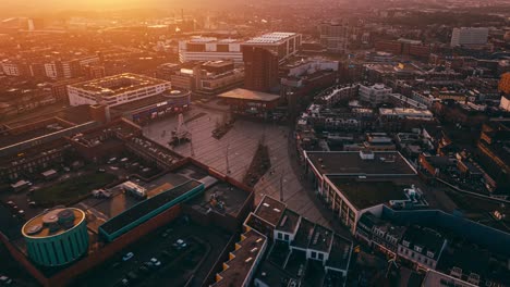 Aerial-hyperlapse-showing-buildings,-cars-and-city-landscape