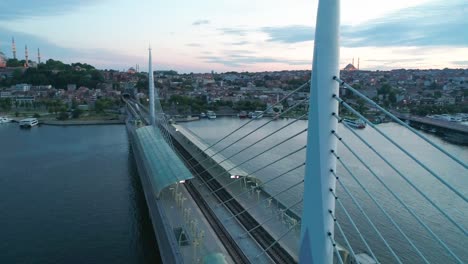 istanbul, unkapani subway bridge aerial footage at sunset