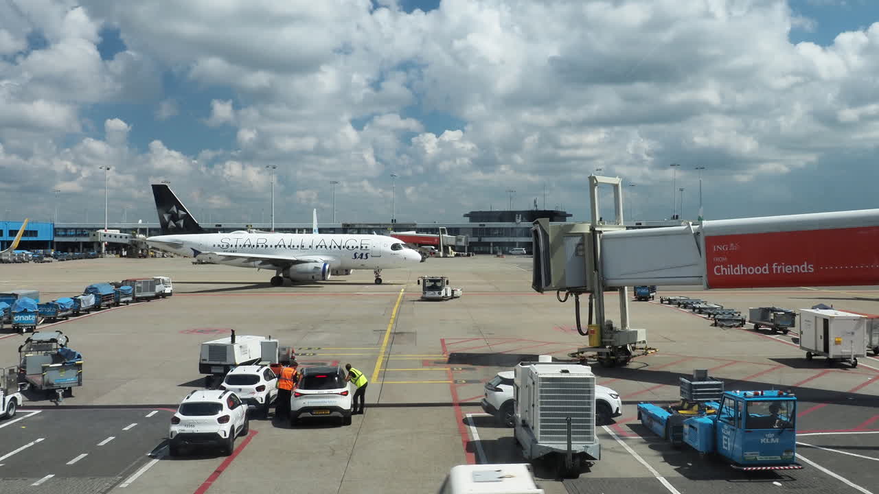 Airport scene with airplane at gate