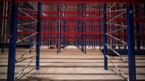 big and modern warehouse under construction, featuring metal shelving and other industrial equipment.