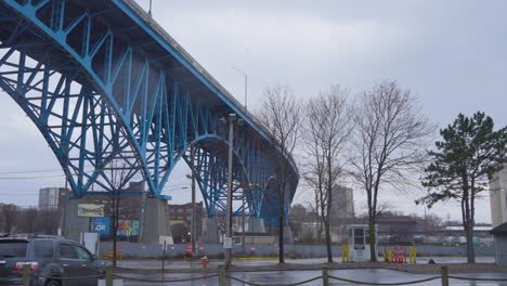 panning-shot-of-blue-bridge,-main-avenue-bridge,-Burton-memorial-bridge-in-Cleveland,-Ohio-near-Lake-Erie-in-the-Flats