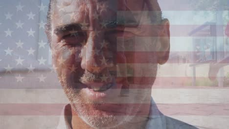 Animation-of-flag-of-united-states-of-america-over-senior-man-on-beach