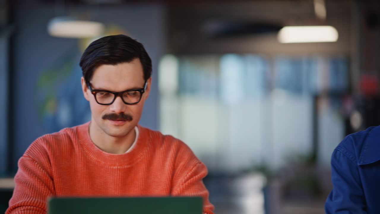 Company staff focused computers in light office closeup. Professional employees