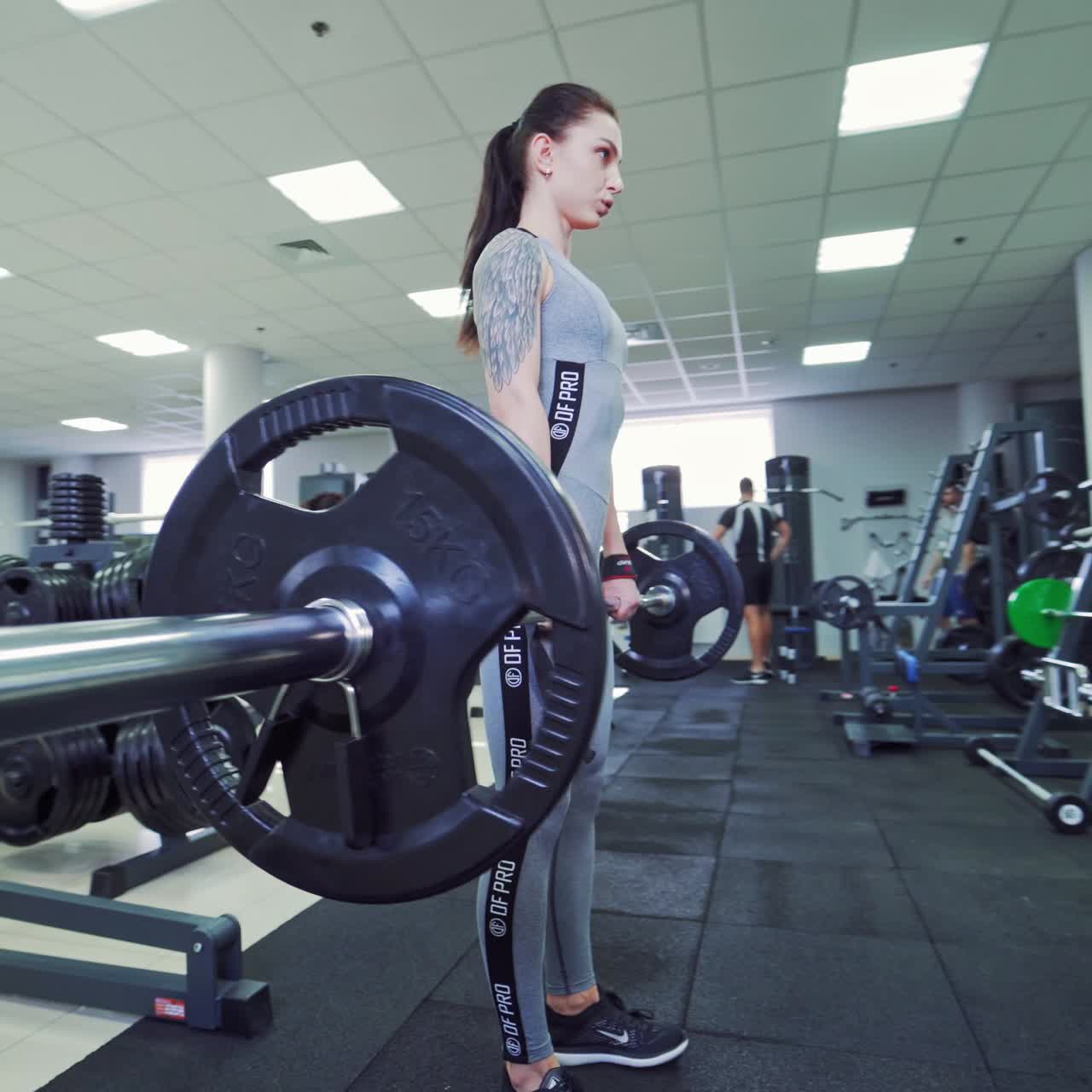 Muscular fit woman exercising