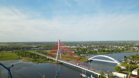 aerial view of cable-stayed bridge over vistula river in gdansk, poland