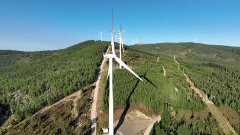 drone footage of a wind power park in portugal