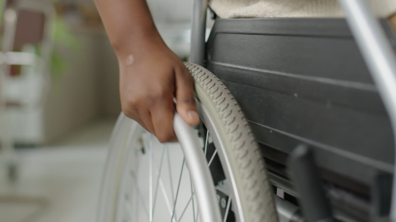 Woman Using Manual Wheelchair