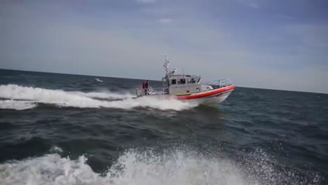 a 45 foot coast guard cutter response boat responds to an emergency