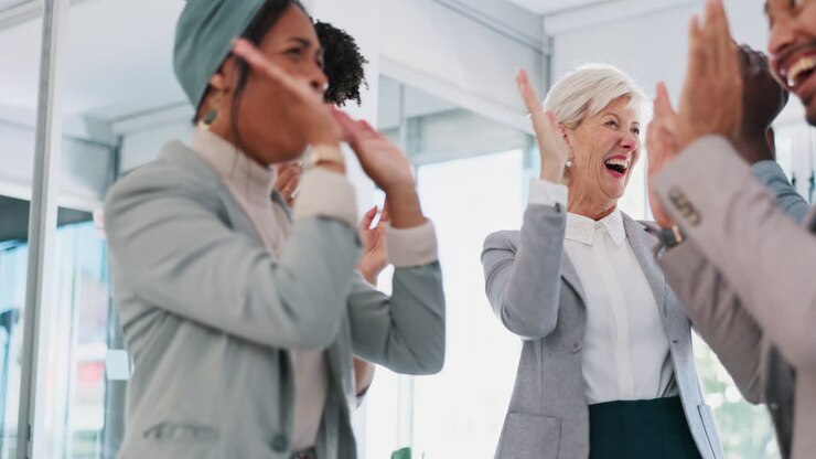 High five, team and support with business people