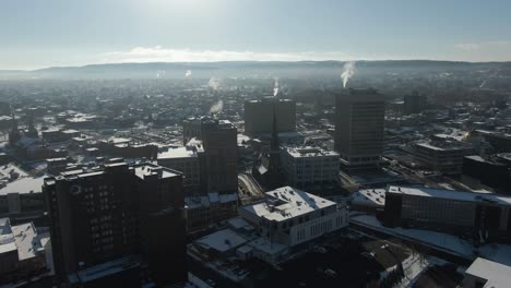 downtown utica, ny aerial view on freezing cold winter morning. hotel utica and county office building