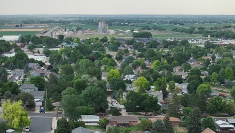 johnstown colorado reverse dolly shot away from the town silos. real estate establishing shot