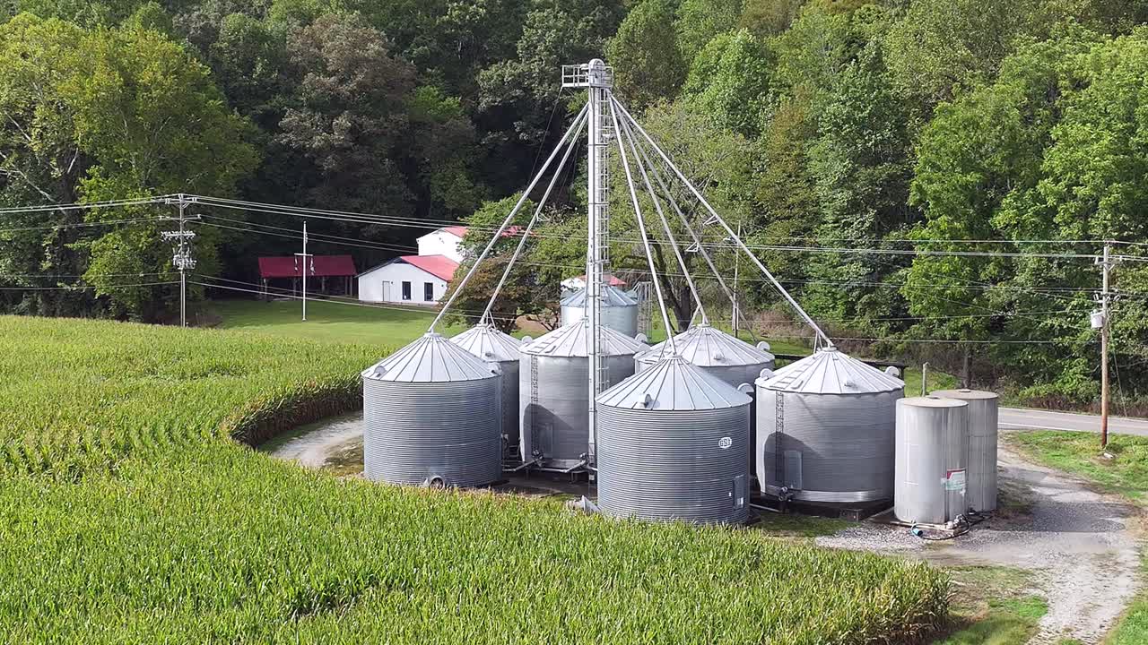 Drone point of view cornfield and Silos