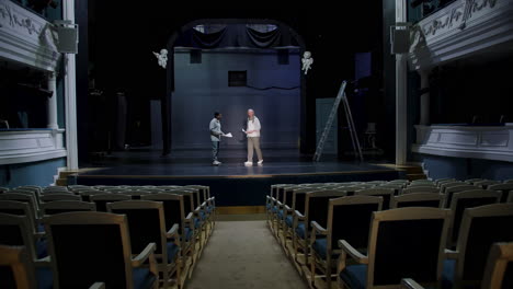 man doing a rehearsal on the stage