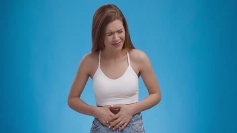 woman experiencing stomach pain